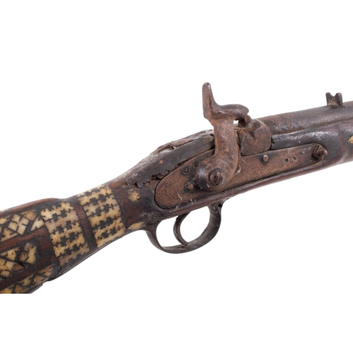 8 - An originally Enfield musket later worked inlaid with Middle Eastern bone decoration circa 1865, wou... 