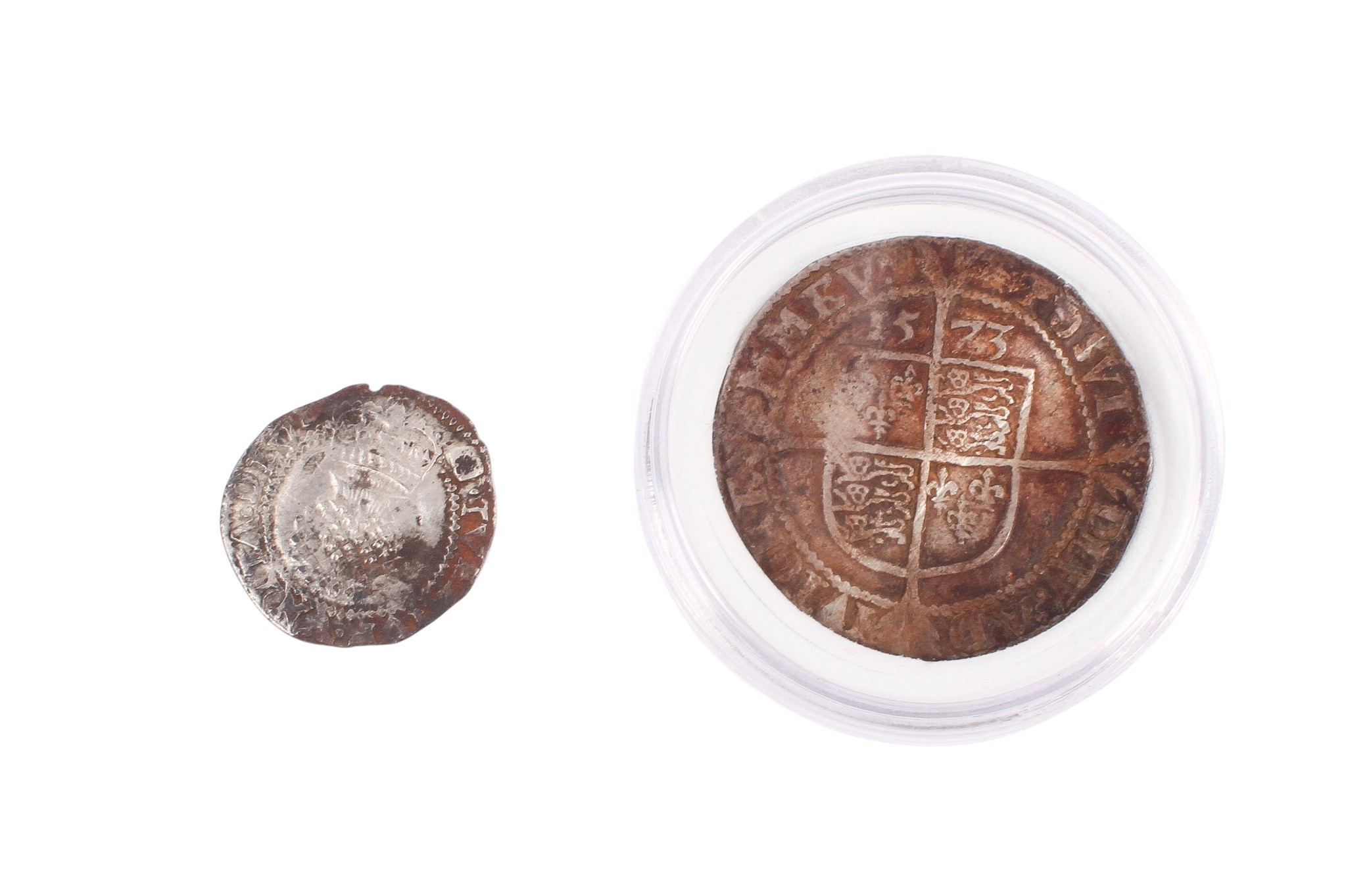 Two hammered coins. 1573 6d creased and a James I half groat