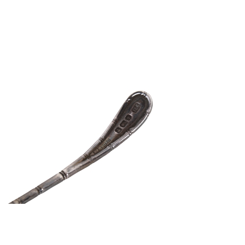 71 - A small 20th century silver coin dish and a Victorian silver sugar sifter. The coin dish having a ri... 