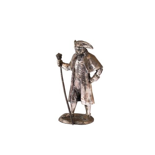 76 - A white metal figure of Napoleon. Unmarked, weighted to the base, H10.5cm.