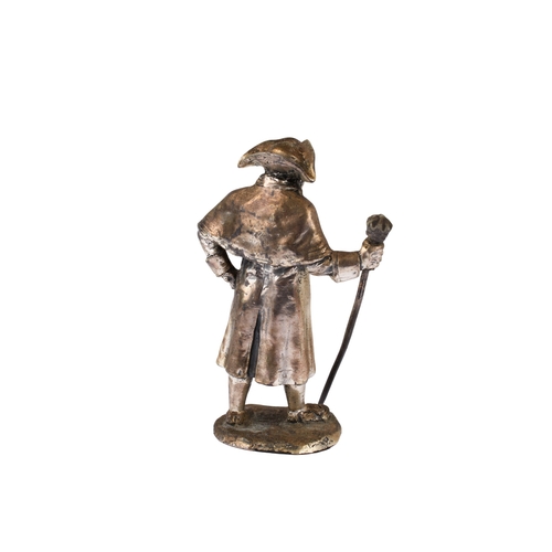 76 - A white metal figure of Napoleon. Unmarked, weighted to the base, H10.5cm.