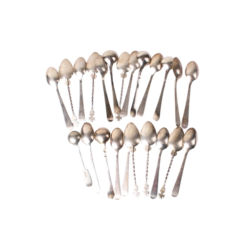 89 - An assortment of silver and white metal teaspoons. Including a set of twelve, the enamel handles dec... 