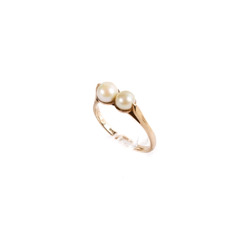 166 - A 9ct gold (tested) double pearl ring. The largest pearl 5.7mm diameter, the smaller of a very pale ... 