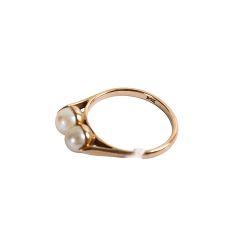 166 - A 9ct gold (tested) double pearl ring. The largest pearl 5.7mm diameter, the smaller of a very pale ... 