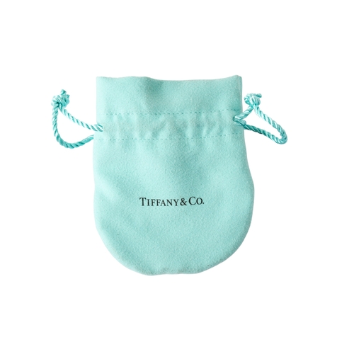 256 - A Tiffany & Co silver necklace and pendant. The pendant engraved 'Please return to Tiffany & Co. New... 