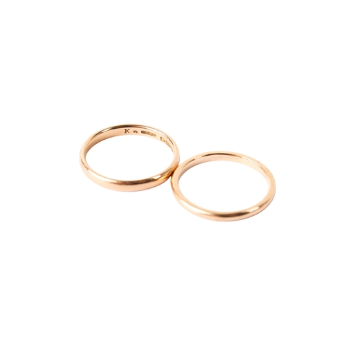 267 - Two 18ct gold wedding bands. One hallmarked, size O1/2, one marked 18ct,