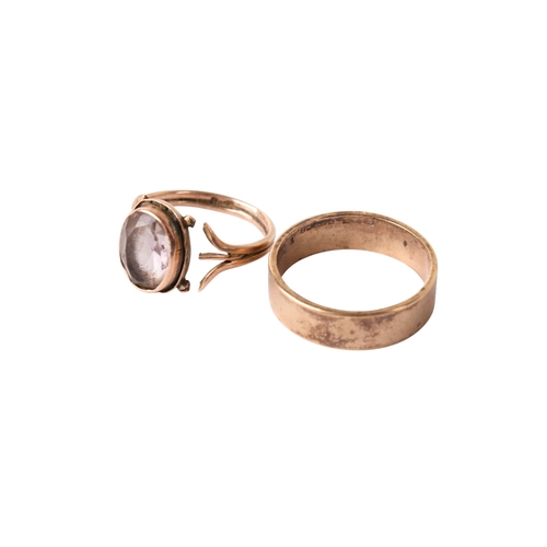 271 - A 9ct gold wedding band and a rose coloured metal and amethyst ring. The wedding band, size Q/R, wei... 