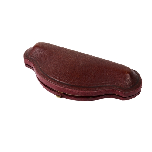 319 - A set of eight yellow metal and red paste dress studs and links. Each diameter 1.2cm, metal unmarked... 