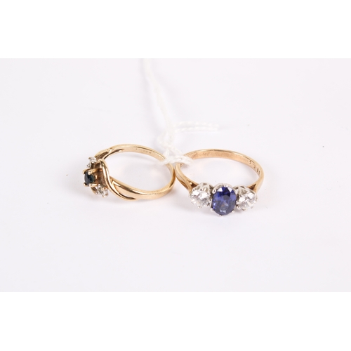 107 - Two 9ct gold and stone rings. The first set with a central sapphire and small diamonds, rubbed hallm... 