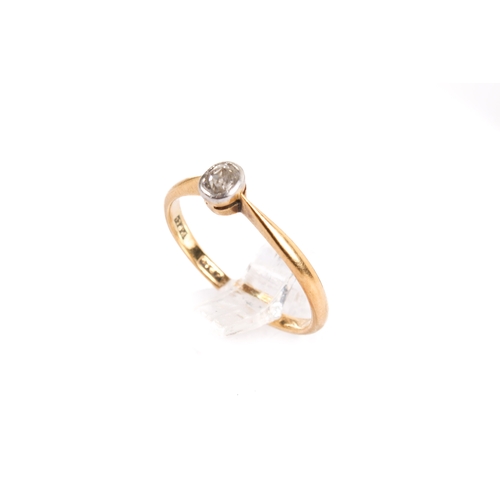 114 - An 18ct gold (tested) single stone diamond ring. Set with an old mine cut diamond of 0.15 carats est... 