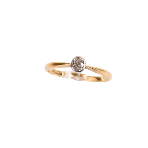 114 - An 18ct gold (tested) single stone diamond ring. Set with an old mine cut diamond of 0.15 carats est... 