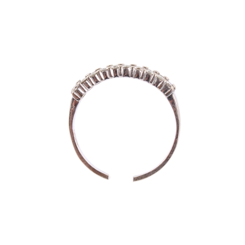 148 - An 18ct white gold (tested) and diamond dress ring. Set with round brilliant cut diamonds of 0.80 ca... 