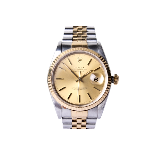 343 - A gentleman's Rolex Oyster Perpetual Day Date wristwatch. The champagne dial with baton hour markers... 