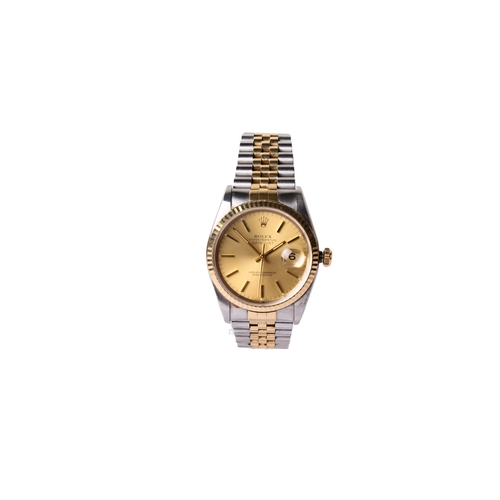 343 - A gentleman's Rolex Oyster Perpetual Day Date wristwatch. The champagne dial with baton hour markers... 