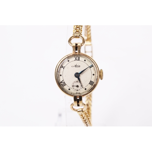 364 - A vintage 9ct gold cased Avia lady's wristwatch. With black Roman numerals and subsidiary dial, rubb... 
