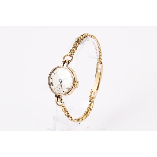 364 - A vintage 9ct gold cased Avia lady's wristwatch. With black Roman numerals and subsidiary dial, rubb... 