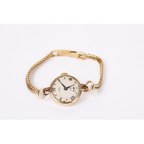 364 - A vintage 9ct gold cased Avia lady's wristwatch. With black Roman numerals and subsidiary dial, rubb... 