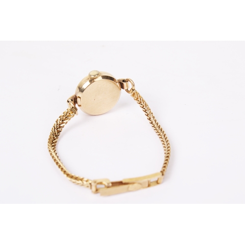 364 - A vintage 9ct gold cased Avia lady's wristwatch. With black Roman numerals and subsidiary dial, rubb... 