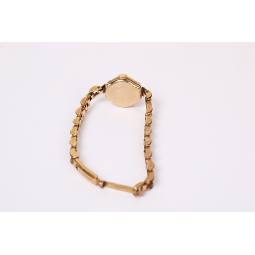 365 - Two 9ct gold and goldplated ladies' vintage dress watches. One with a gilt face and black markers, s... 
