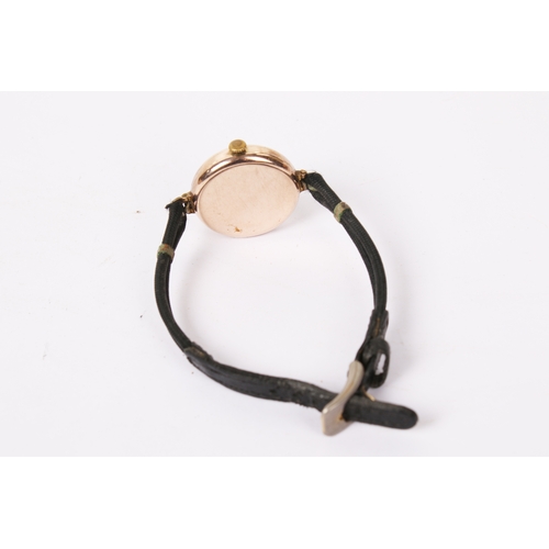 371 - A 9ct gold cased wristwatch. The white enamel face with black and red Arabic numerals, hallmarks to ... 