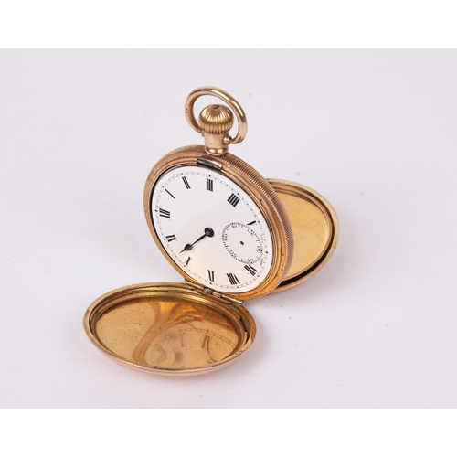 373 - TBV. A vintage yellow metal full hunter pocket watch. With engine turned decoration to both sides, b... 