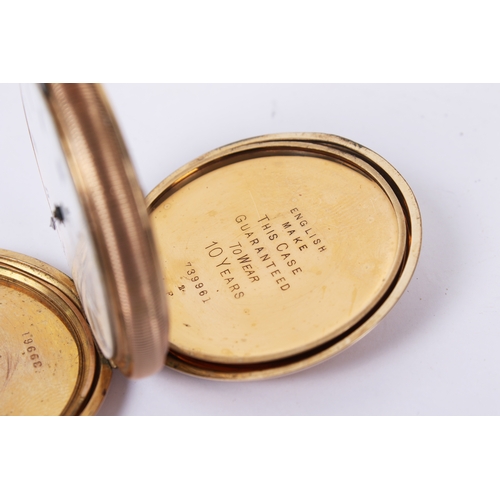 373 - TBV. A vintage yellow metal full hunter pocket watch. With engine turned decoration to both sides, b... 
