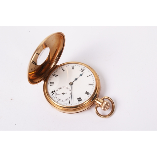 376 - A 9ct gold half hunter pocket watch. Black Roman numerals and subsidiary dial to the white face, hal... 