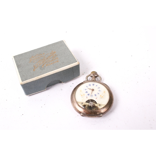 422 - A Swiss 'Hebdomas' style silver pocket watch. With blue Roman numerals and gilt floral decoration to... 
