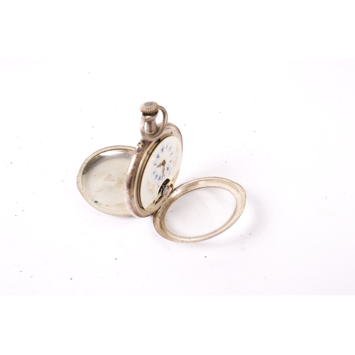 422 - A Swiss 'Hebdomas' style silver pocket watch. With blue Roman numerals and gilt floral decoration to... 