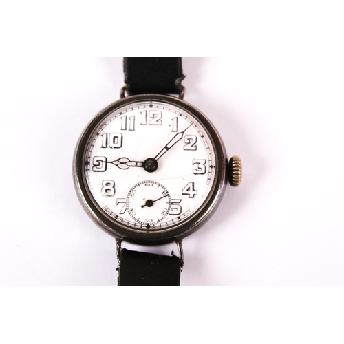 384 - Four silver cased watches. Comprising a pocket watch, the white enamel dial with Arabic numerals, di... 