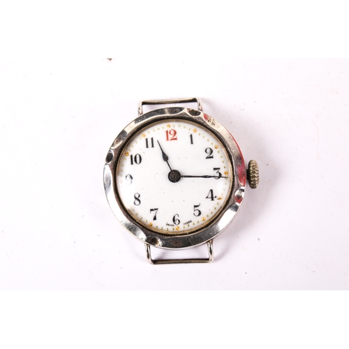 384 - Four silver cased watches. Comprising a pocket watch, the white enamel dial with Arabic numerals, di... 