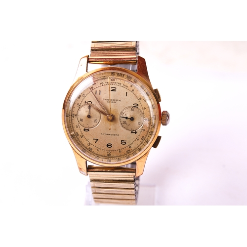 385 - A gentleman's Swiss chronograph watch. The gilt dial having Arabic numerals and two subsidiary dials... 
