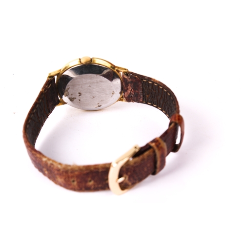 393 - A gentleman's vintage Smiths wristwatch. The gilt face having Arabic numerals, in a gold plated case... 