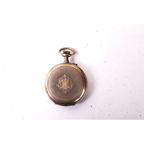 422 - A Swiss 'Hebdomas' style silver pocket watch. With blue Roman numerals and gilt floral decoration to... 