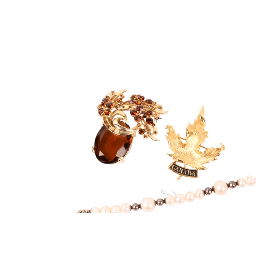 439 - Three pieces of jewellery. Comprising a necklet of cultured freshwater (assessed) freshwater pearls,... 