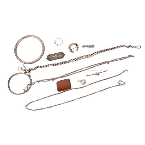 444 - A small group of silver and white metal jewellery. Including two bangles, brooches, one stone set, A... 