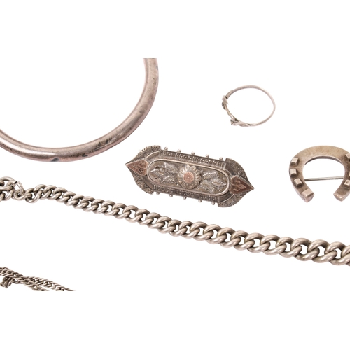 444 - A small group of silver and white metal jewellery. Including two bangles, brooches, one stone set, A... 
