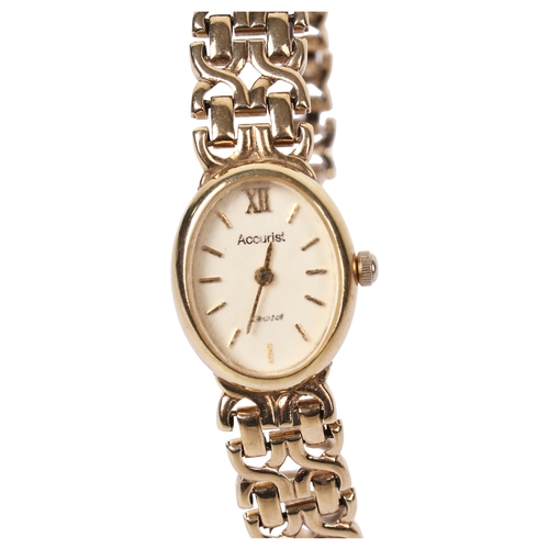 363 - A lady's 9ct gold Accurist wristwatch. The oval case having a champagne dial with baton hour markers... 