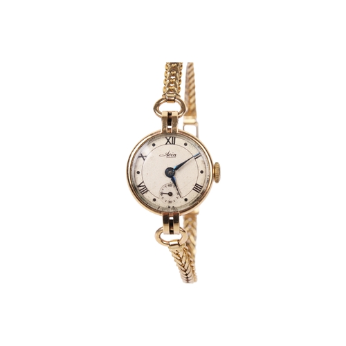 364 - A vintage 9ct gold cased Avia lady's wristwatch. With black Roman numerals and subsidiary dial, rubb... 