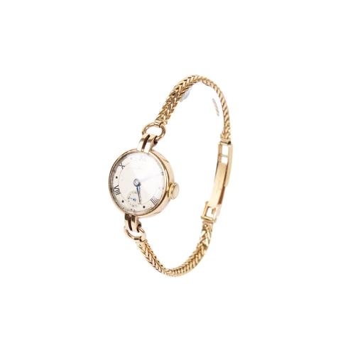 364 - A vintage 9ct gold cased Avia lady's wristwatch. With black Roman numerals and subsidiary dial, rubb... 