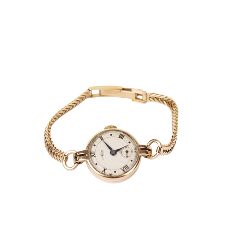 364 - A vintage 9ct gold cased Avia lady's wristwatch. With black Roman numerals and subsidiary dial, rubb... 