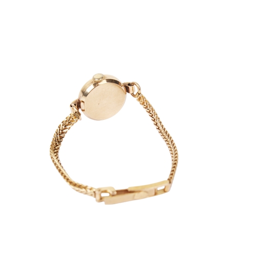 364 - A vintage 9ct gold cased Avia lady's wristwatch. With black Roman numerals and subsidiary dial, rubb... 