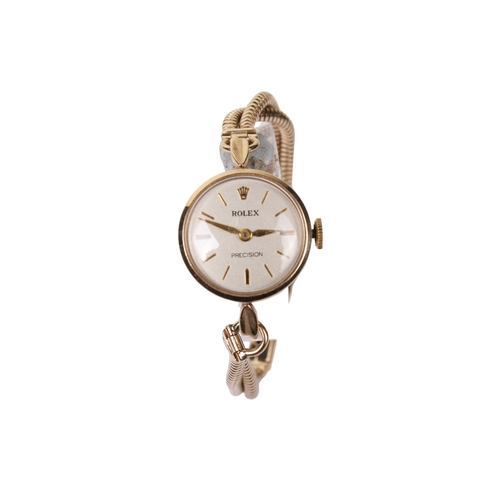 366 - A 1930s lady's 9ct gold Rolex Precision watch. The silvered dial having baton hour markers, in a 9ct... 