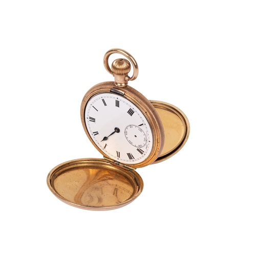 373 - TBV. A vintage yellow metal full hunter pocket watch. With engine turned decoration to both sides, b... 