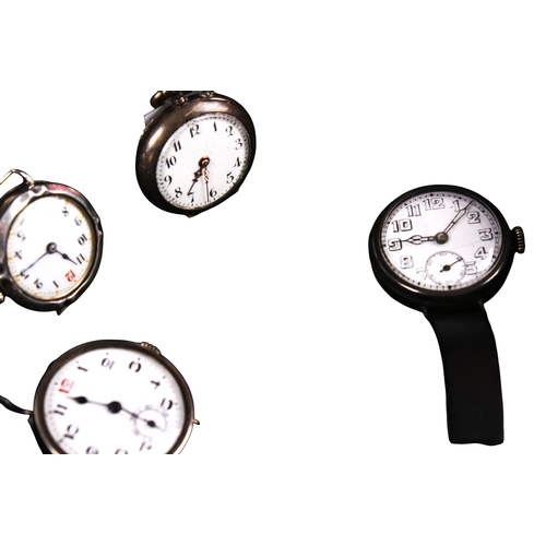 384 - Four silver cased watches. Comprising a pocket watch, the white enamel dial with Arabic numerals, di... 