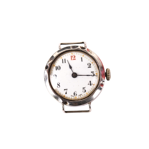 384 - Four silver cased watches. Comprising a pocket watch, the white enamel dial with Arabic numerals, di... 