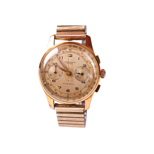 385 - A gentleman's Swiss chronograph watch. The gilt dial having Arabic numerals and two subsidiary dials... 