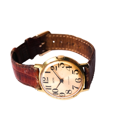 393 - A gentleman's vintage Smiths wristwatch. The gilt face having Arabic numerals, in a gold plated case... 