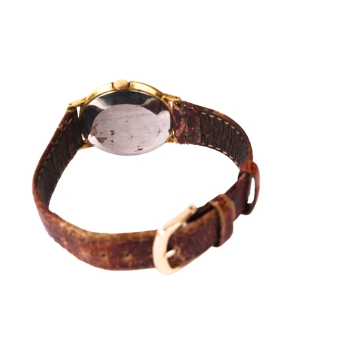 393 - A gentleman's vintage Smiths wristwatch. The gilt face having Arabic numerals, in a gold plated case... 