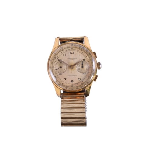 385 - A gentleman's Swiss chronograph watch. The gilt dial having Arabic numerals and two subsidiary dials... 